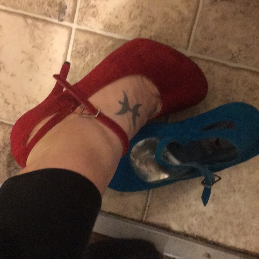 Two pair of stiletto high heels.